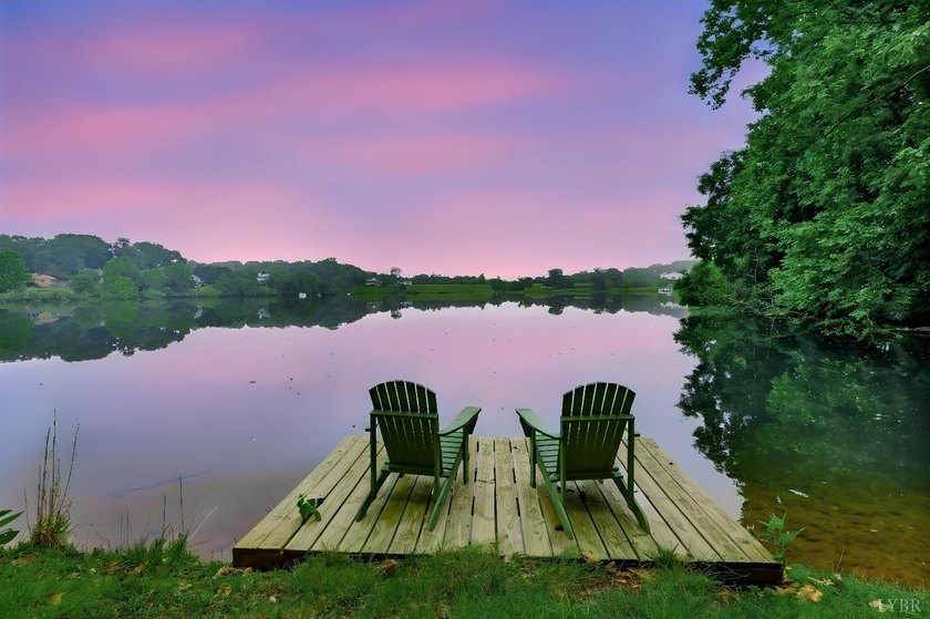 Nestled at the end of a private drive, this lakeside sanctuary - photo 13