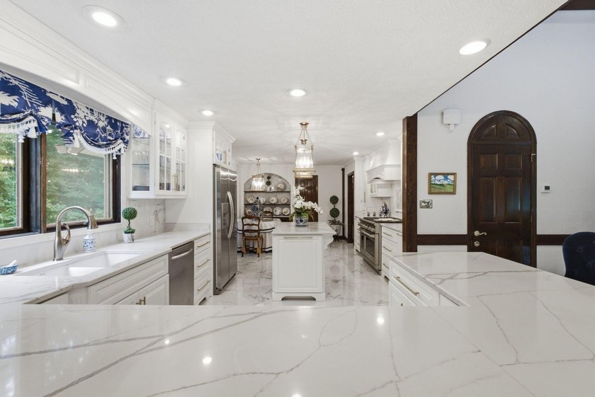 Welcome to 305 Beech Street, a truly special Tudor-inspired home - photo 23