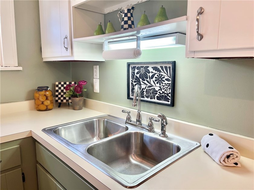 Welcome home to this charming 4-bedroom property offering the - photo 17