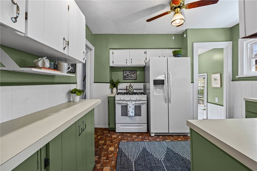 Welcome home to this charming 4-bedroom property offering the - photo 18