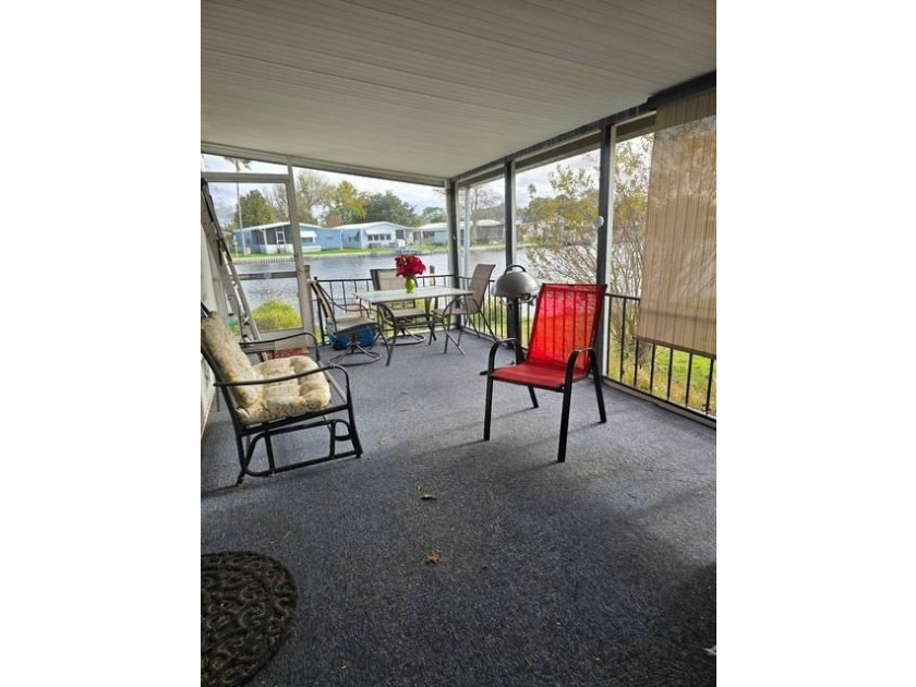 Live on the water ! Lovely screened in porch all year views of - photo 4