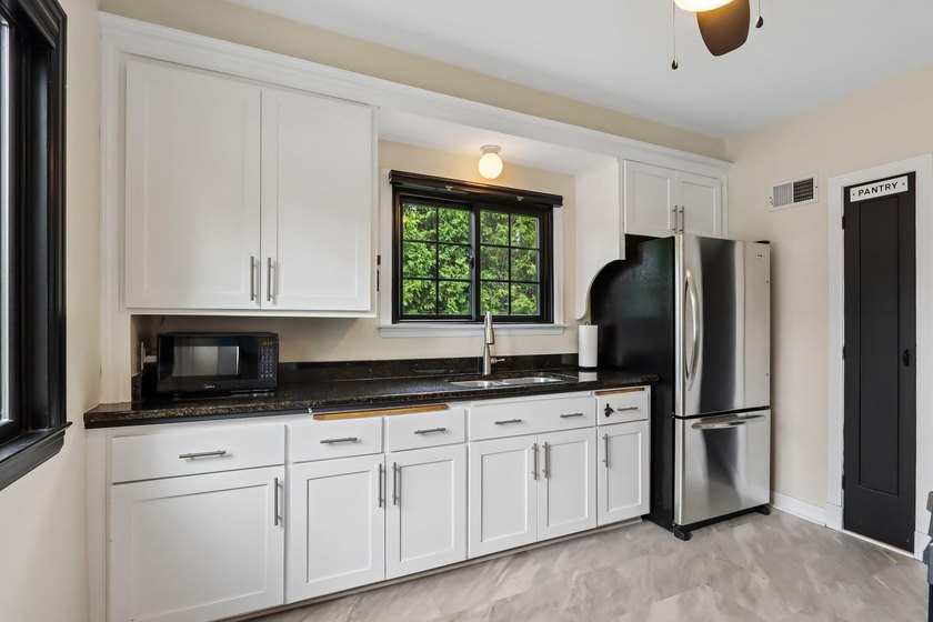 Stunning remodeled Cape Cod on Big Muskego Lake offering a rare - photo 8