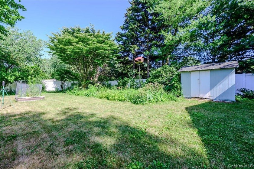 Welcome home to this well-maintained ranch, where timeless - photo 17