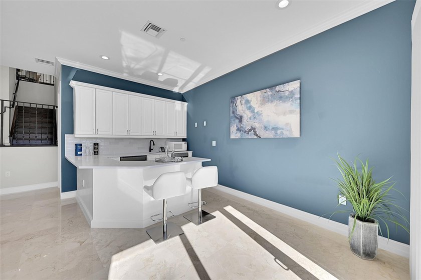 Luxury waterfront living with direct ocean access and no fixed - photo 12