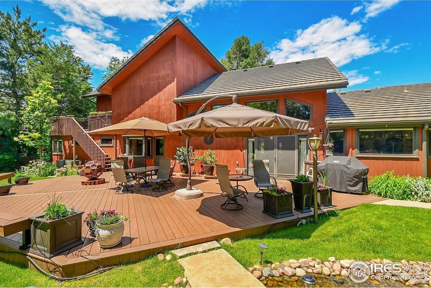 This exceptional custom home sits directly across from the - photo 3