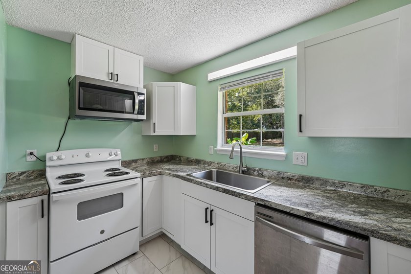 Welcome to 310 Watts Street in Saint Marys, GA! This charming - photo 17