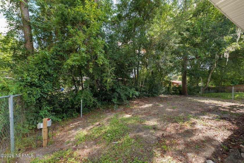 This charming cottage-style home with 3 beds + 2 baths is - photo 26