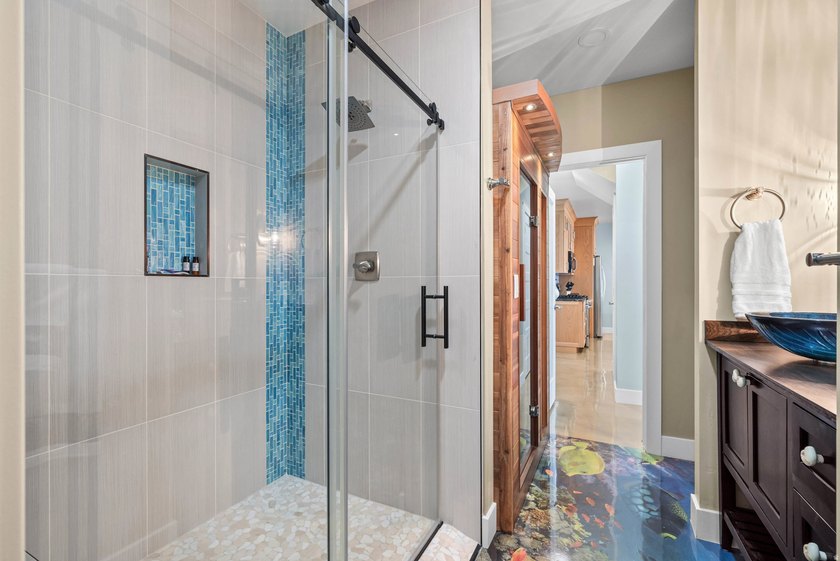 Custom-built waterfront luxury resort home, located in a private - photo 38