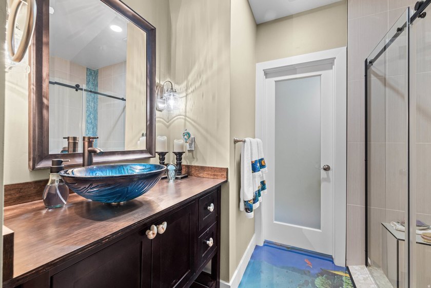 Custom-built waterfront luxury resort home, located in a private - photo 39