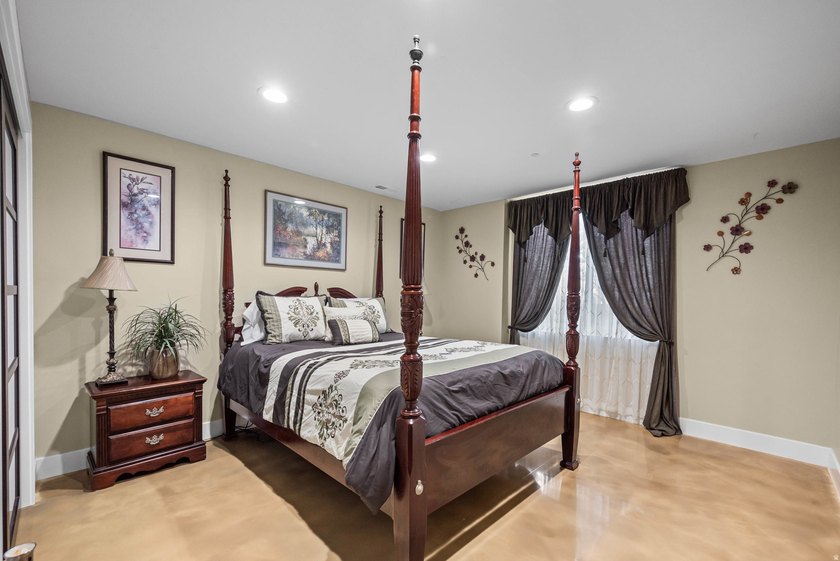 Custom-built waterfront luxury resort home, located in a private - photo 47