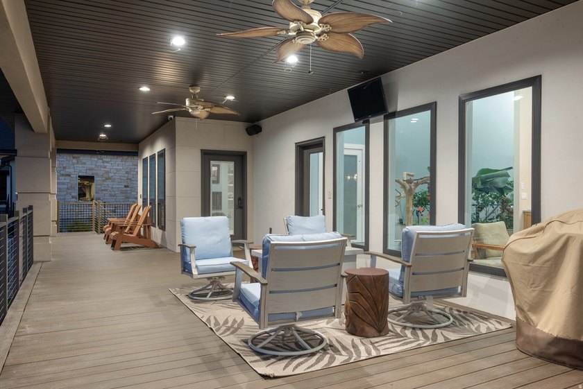 Custom-built waterfront luxury resort home, located in a private - photo 53