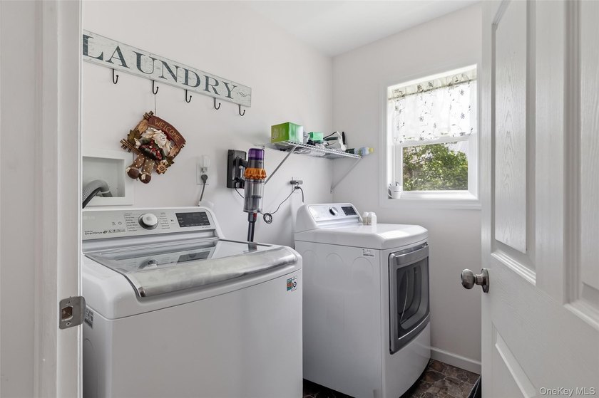 A Barnum Island beauty. This 3 Bdrm 2 Full Bath dormered raised - photo 12