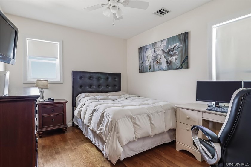 A Barnum Island beauty. This 3 Bdrm 2 Full Bath dormered raised - photo 15