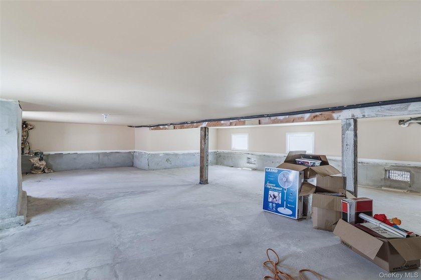 A Barnum Island beauty. This 3 Bdrm 2 Full Bath dormered raised - photo 18
