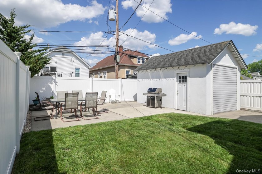 A Barnum Island beauty. This 3 Bdrm 2 Full Bath dormered raised - photo 24