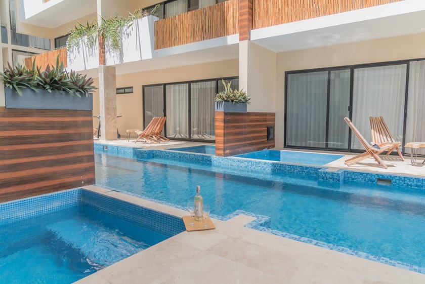 Discover the pinnacle of Tulum living in this beautiful - photo 4