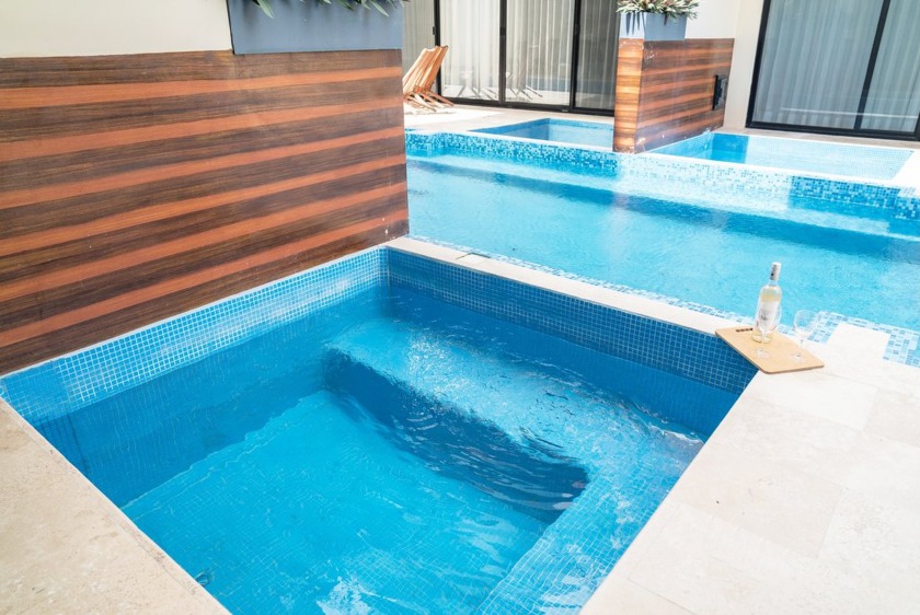 Discover the pinnacle of Tulum living in this beautiful - photo 5