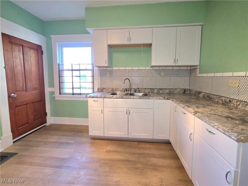 Welcome HOME to 9112 Parmelee Ave, in Cleveland! A charming and - photo 9