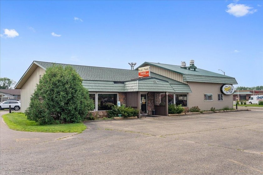 Here's your chance to own a versatile commercial property in a - photo 2