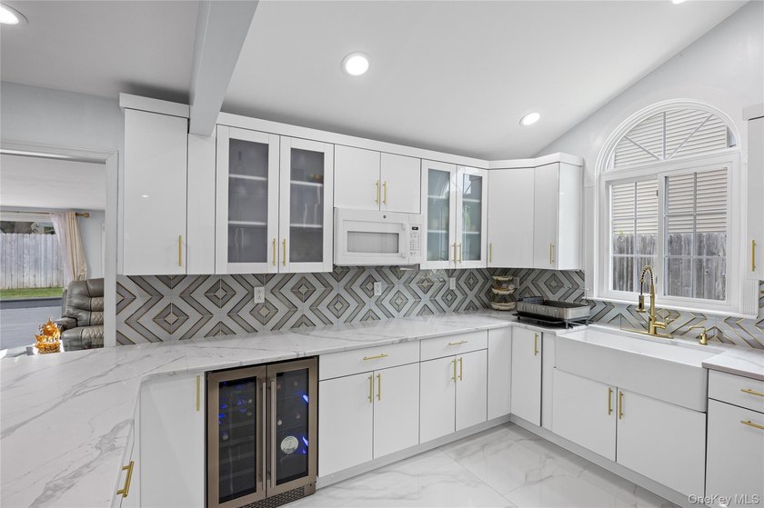 Welcome to 1022 Fire Island Avenue, a beautifully maintained - photo 16