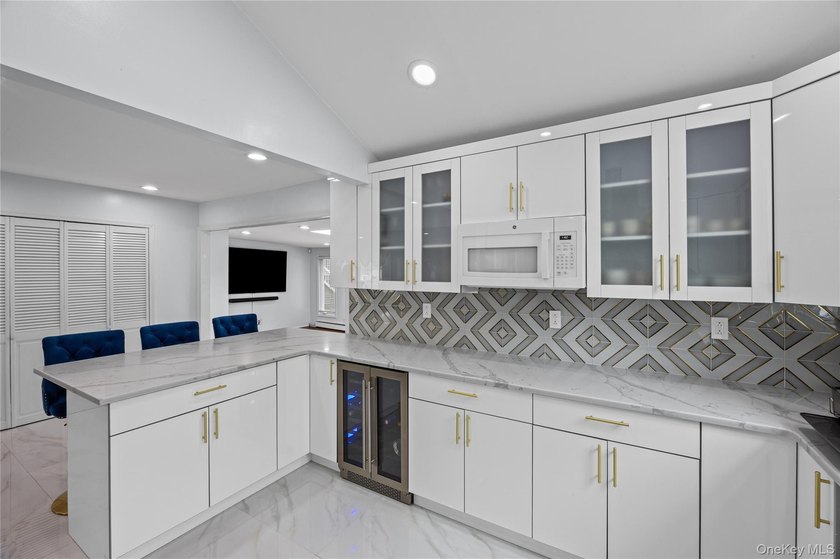 Welcome to 1022 Fire Island Avenue, a beautifully maintained - photo 18
