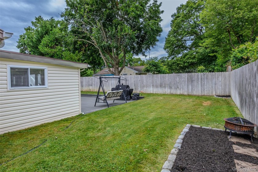 Welcome to 1022 Fire Island Avenue, a beautifully maintained - photo 33