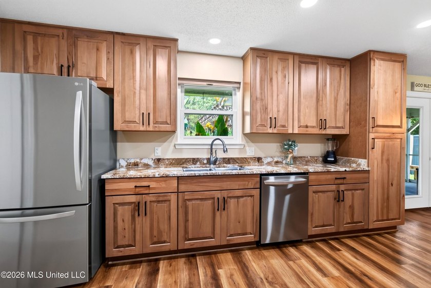 Welcome to 13000 Quail Ridge Road, a spacious property situated - photo 13