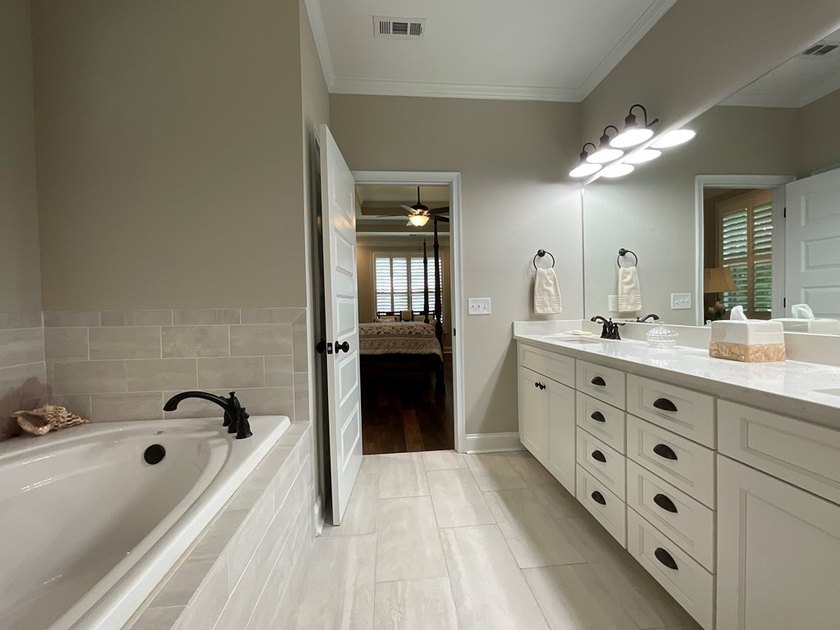 This classically designed home exudes charm and beauty - photo 26
