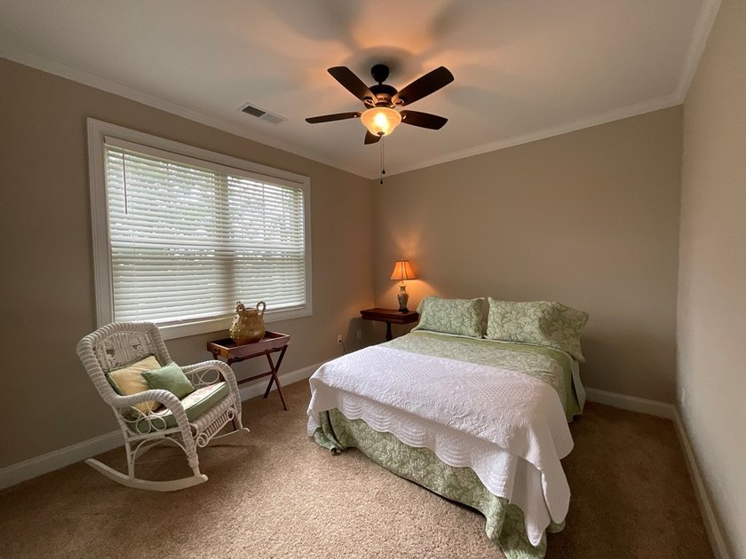 This classically designed home exudes charm and beauty - photo 34