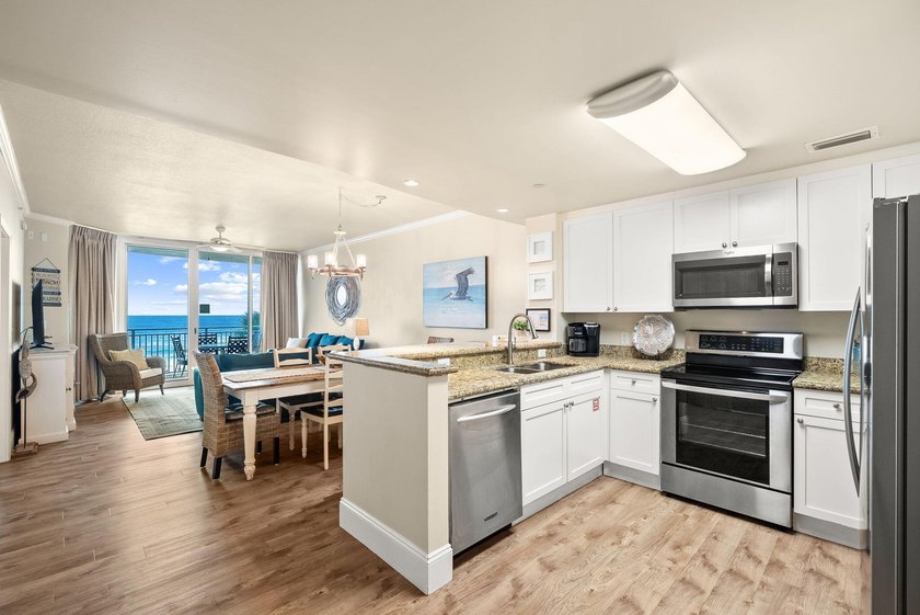 Wake up to breathtaking Gulf views from this beautifully updated - photo 12