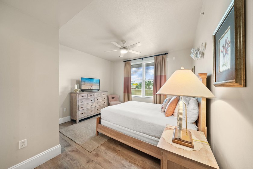 Wake up to breathtaking Gulf views from this beautifully updated - photo 16