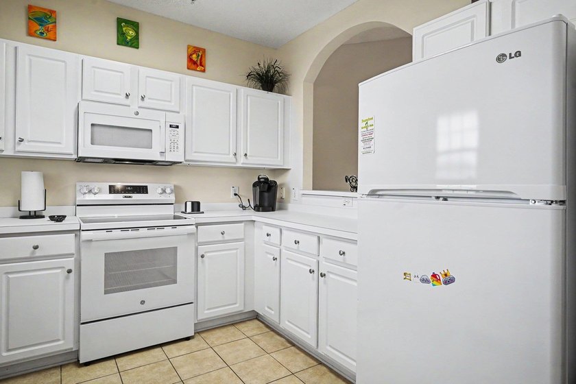 Welcome to your coastal retreat in the highly sought-after - photo 12