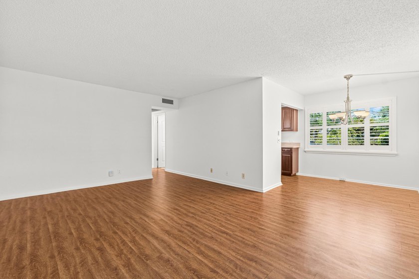 STEP INTO YOUR FIRST-FLOOR DREAM CONDO IN AN ACTIVE 55 + - photo 2