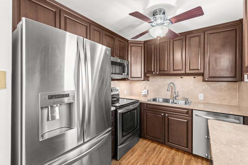STEP INTO YOUR FIRST-FLOOR DREAM CONDO IN AN ACTIVE 55 + - photo 10
