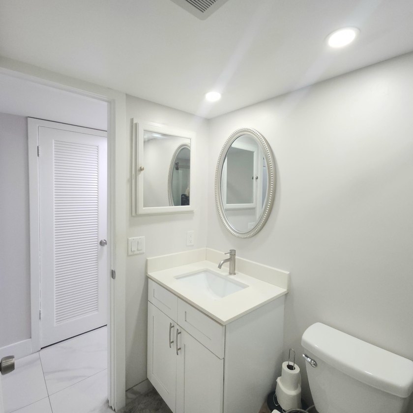 Spectacular renovated 1st floor condo in the active 55 community - photo 9