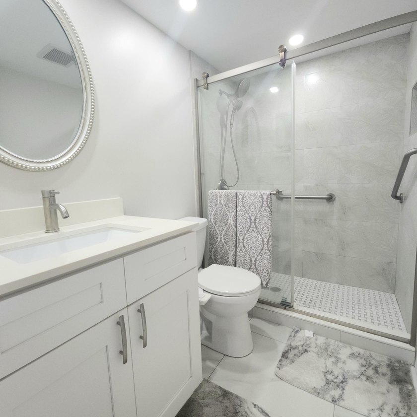 Spectacular renovated 1st floor condo in the active 55 community - photo 10