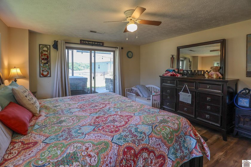 Located in Malcolm Creek on Kentucky Lake in Benton, KY, this - photo 46