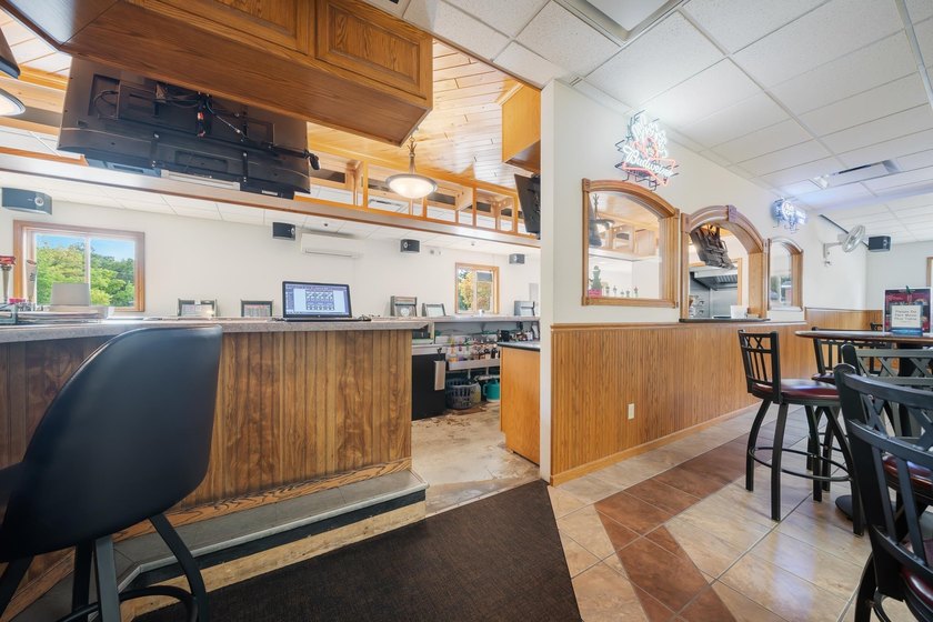 This property is more than just a commercial space; it's an - photo 11