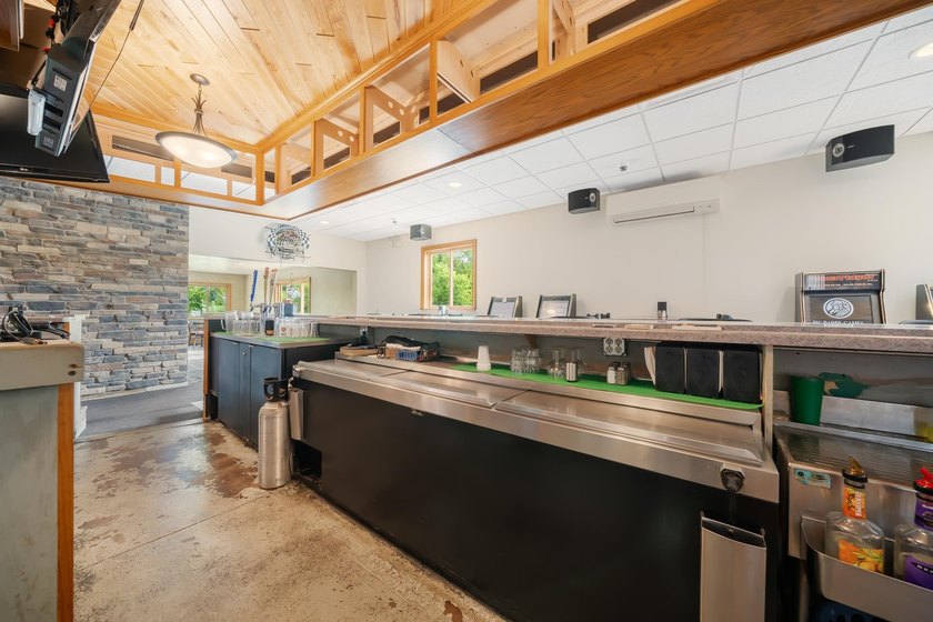 This property is more than just a commercial space; it's an - photo 14