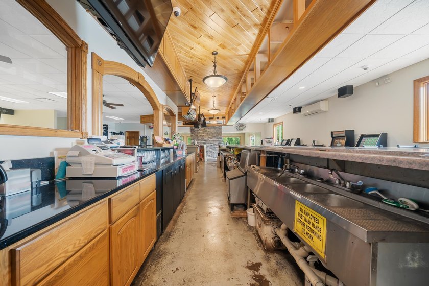 This property is more than just a commercial space; it's an - photo 16