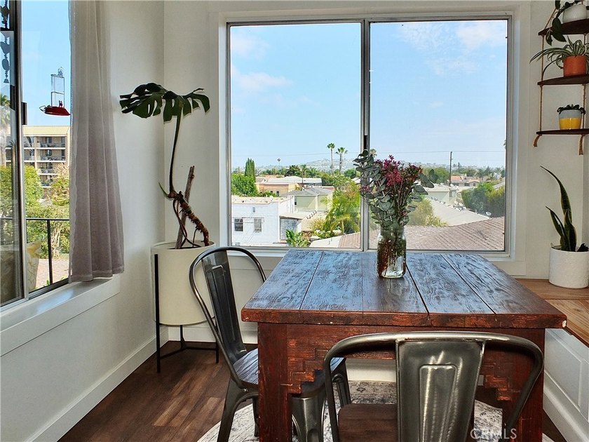Views, Views, Views! Perched on the top floor of the prestigious - photo 18