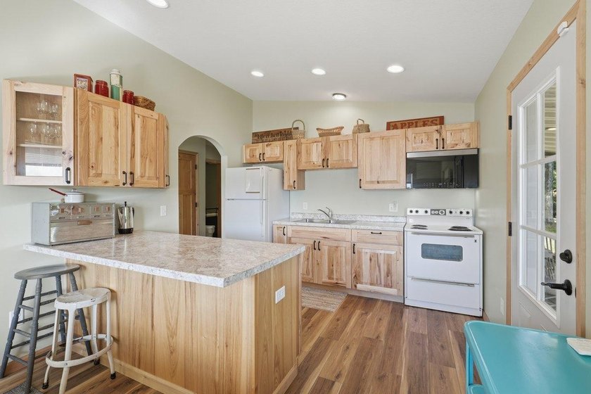 This beautiful four-year-old home on Little Blake Lake offers a - photo 12