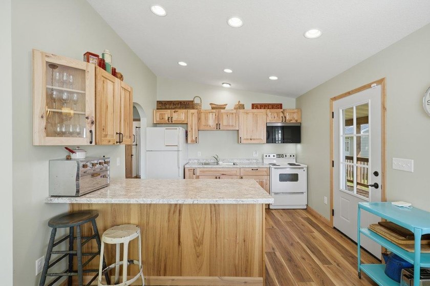 This beautiful four-year-old home on Little Blake Lake offers a - photo 14