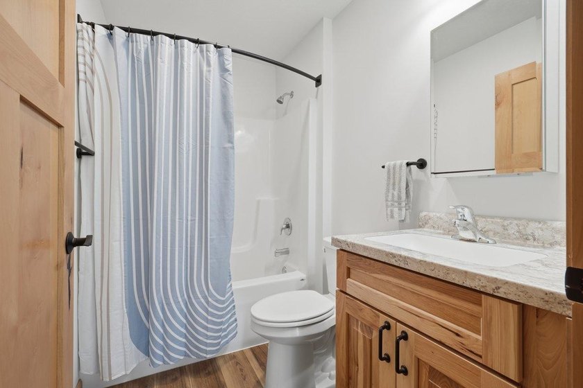 This beautiful four-year-old home on Little Blake Lake offers a - photo 21