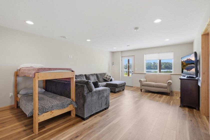 This beautiful four-year-old home on Little Blake Lake offers a - photo 22