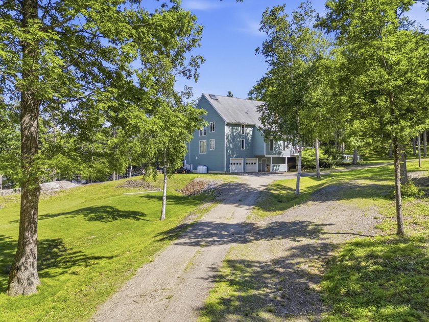 Nestled along the shore of the Kennebec River, this private 3BR - photo 5