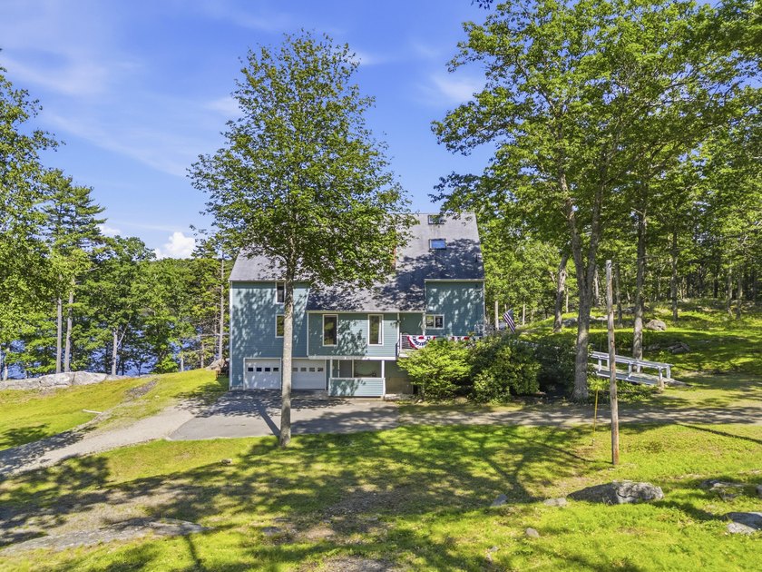 Nestled along the shore of the Kennebec River, this private 3BR - photo 10