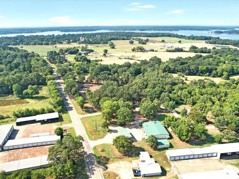 Over 5 acres waiting to be developed! Situated within minutes of - photo 3