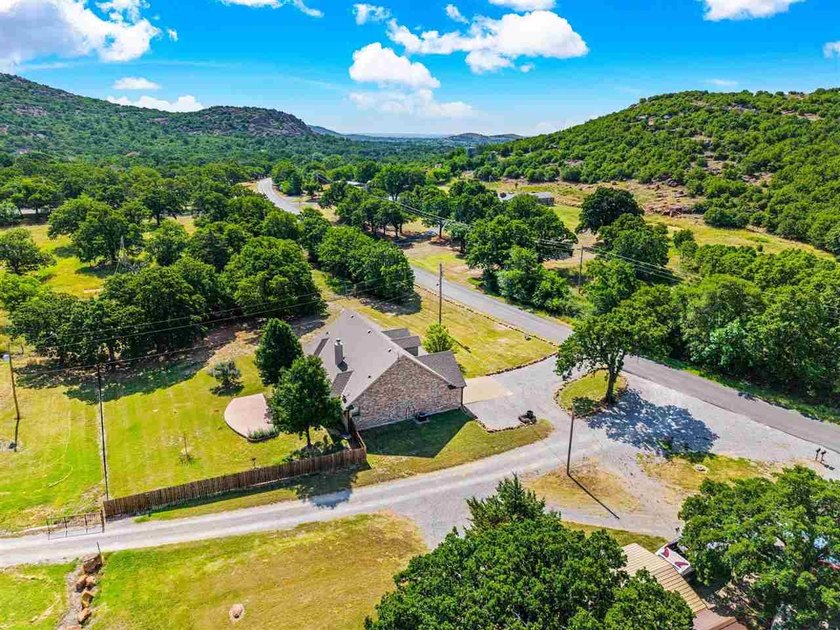 This cozy Medicine Park home has it all: Serene views of the - photo 5