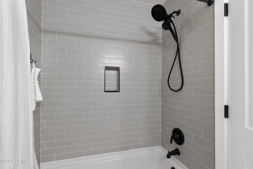 Completely renovated in 2024, this charming 3-bedroom, 2.5-bath - photo 26
